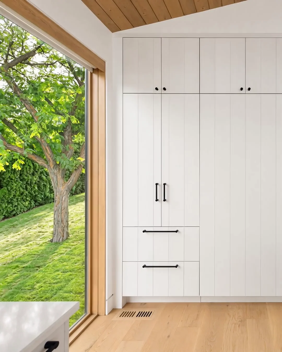 Finished space — Tall cabinetry